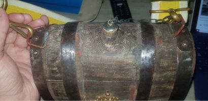 null Wooden canteen keg with polychromatic remains. It is decorated with a brass...