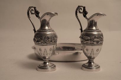 null Pair of silver liturgical cruets decorated with vine and reed branches, flowers...