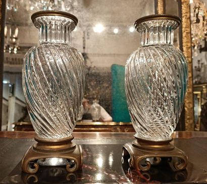 null Baccarat house. Pair of baluster-shaped vases in cut Baccarat crystal with a...