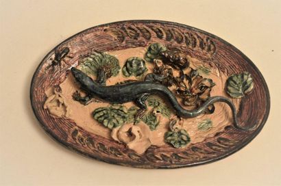 null In the taste of Palissy's 19th century era. Polychrome ceramic dish decorated...