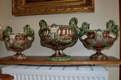 null Majolica set comprising a large vase and a pair of small vases, with polychrome...