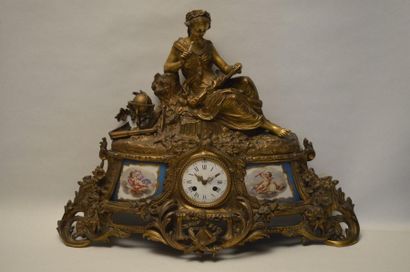 null Gilded bronze mantel clock with science allegory decorations and putti painted...