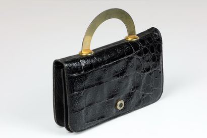 null 
LOUIS FERAUD. Evening bag in black imitation crocodile and gold metal handle....