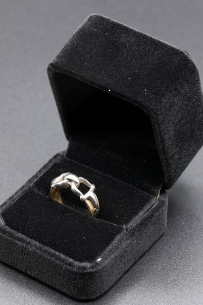 null HERMES. Ring in 18K yellow and white gold, stirrup model. Signed Hermès-Paris....