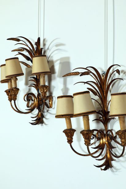 null 
House JANSEN (In the taste of)


Pair of patinated gilt metal sconces with...