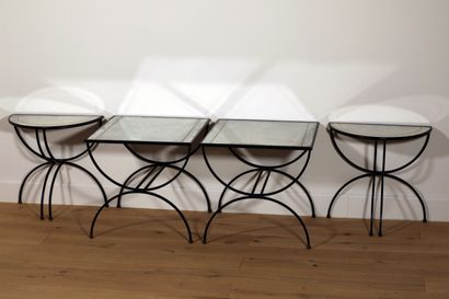 null 
RINGED HOUSE (In the taste of)
Set of four modular coffee tables consisting...