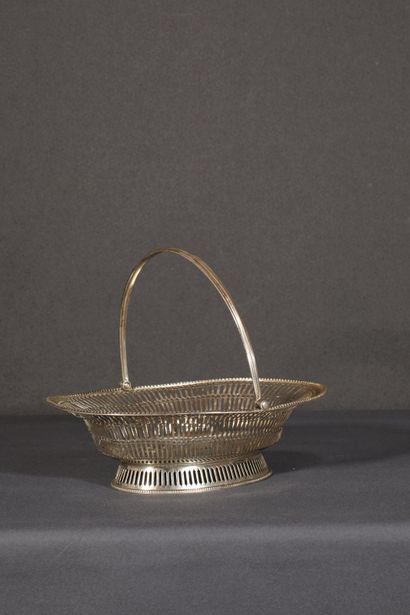 null Silver fruit basket. Oval shaped model resting on a pedestal edged with pearls....