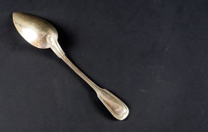 null White metal stew spoon.