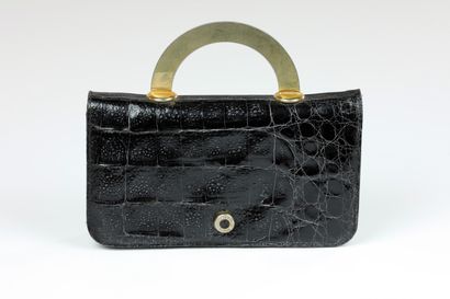 null 
LOUIS FERAUD. Evening bag in black imitation crocodile and gold metal handle....