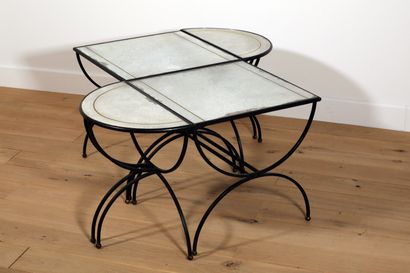 null 
RINGED HOUSE (In the taste of)
Set of four modular coffee tables consisting...