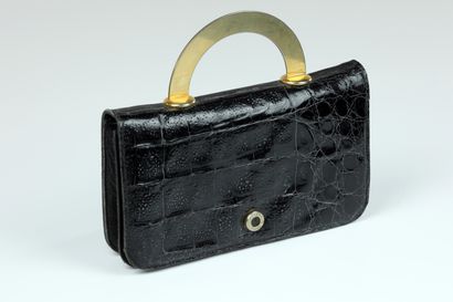 null 
LOUIS FERAUD. Evening bag in black imitation crocodile and gold metal handle....