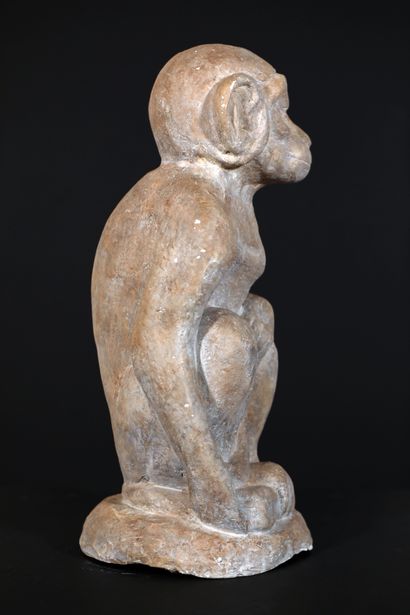 null 
Sculpture in terracotta with white/grey patina representing a sitting monkey...