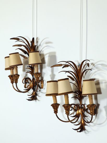 null 
House JANSEN (In the taste of)


Pair of patinated gilt metal sconces with...