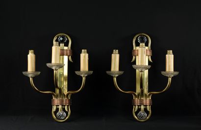 null Pair of bronze sconces with three arms of light with double patina, gilded and...