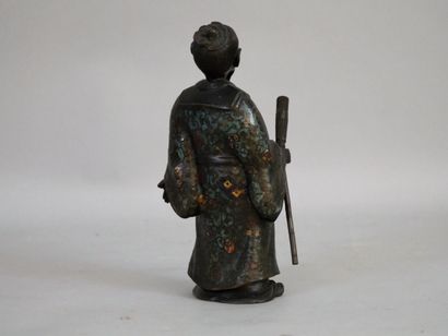 null A Chinese bronze servant with cloisonné enamel. China, late 19th century. Height...