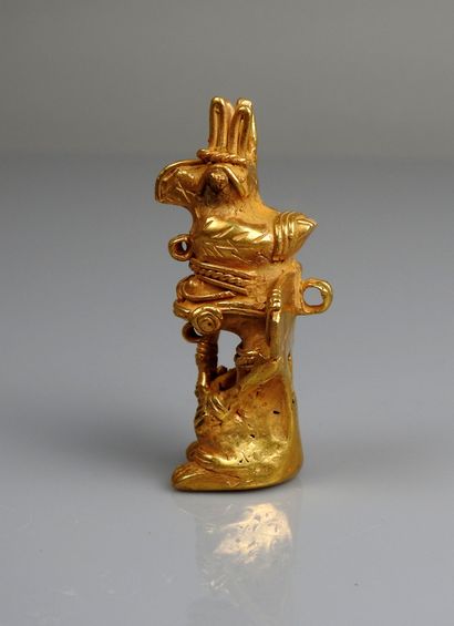 null 
Statuette representing a chief (or a shaman) wearing a bird headdress and carrying...