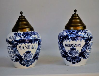 null Pair of blue and white earthenware pharmacy jars, named MANILLA and BERGAMOT,...