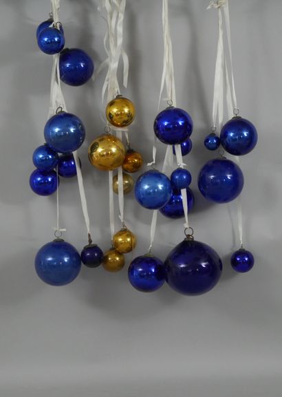 null Lots of about thirty old Christmas ornaments made of blue and gold eglomerate...