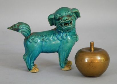null Turquoise ceramic dog. China, 20th century. Height: 14 cm (tail glued back and...