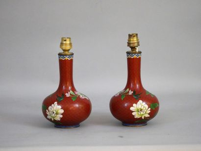 null A pair of cloisonné enamel vases decorated with flowers and birds. China, early...