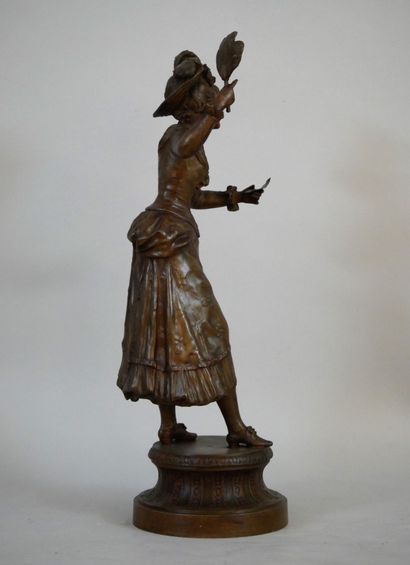 null Regula subject representing a woman with a hat, probably a singer, holding in...