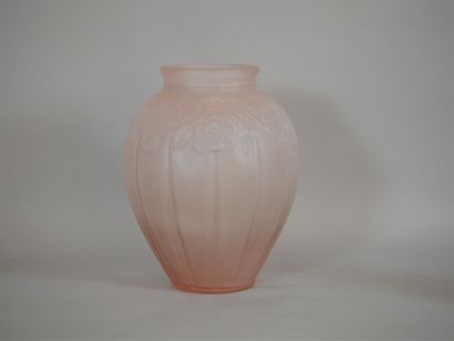 null Large pink glass vase molded and pressed with decoration of garlands of flowers....
