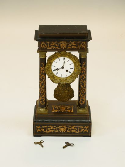 null Portico clock in rosewood and boxwood veneer, consisting of a white enamelled...