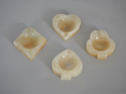 null Set of four hard stone ashtrays in the shape of a heart, a spade, a diamond...