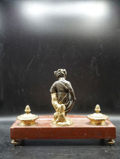 null Neoclassical style gilt bronze and cherry bronze inkwell. Decorated

of a little...