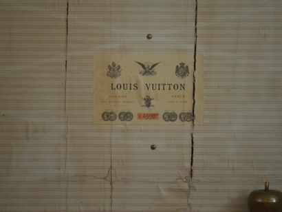 null Louis VUITTON. Wooden trunk with a flat lid and iron fittings decorated with

painted...
