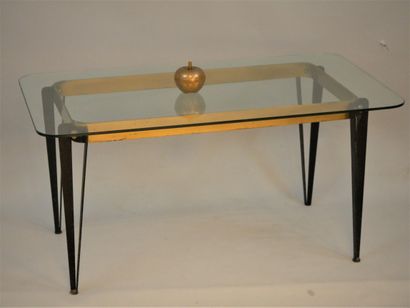 null Gilt metal coffee table, compass legs supporting a glass top, rounded edges....
