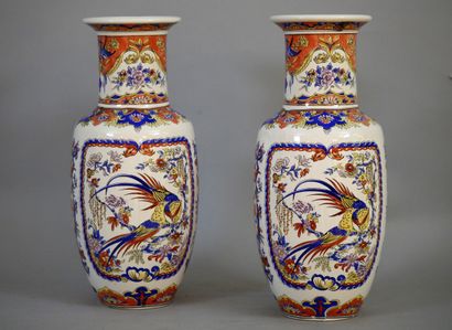 null Pair of polychrome ceramic vases with Chinese decoration including pheasants...