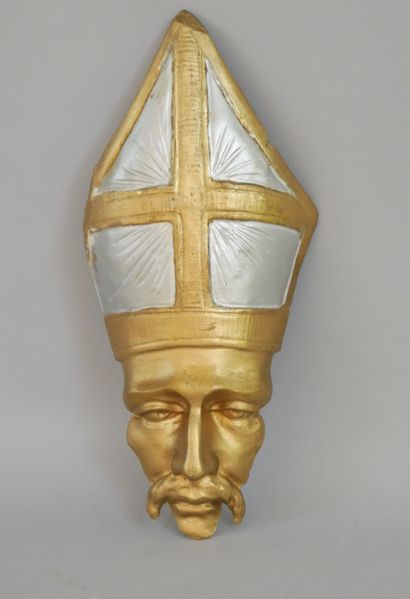 null 
Bishop's head, carved wood paneling repainted in gold and silver. Italian work...