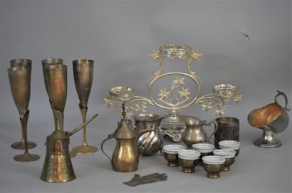 null Silver plated lot including 5 champagne flutes, a display stand, two tea pots,...