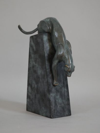 null MILO (born 1955) 

Panther

Bronze with green patina signed Milo on the thigh...