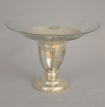 null Elegant engraved glass bowl with geometrical decoration resting on a silver...