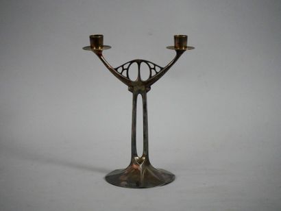 null WMF. Silver plated pewter candelabra with two arms of light. Height : 26,5 cm....