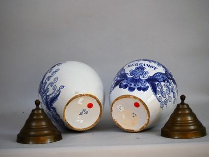 null Pair of blue and white earthenware pharmacy jars, named MANILLA and BERGAMOT,...