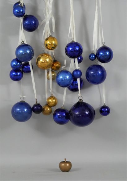 null Lots of about thirty old Christmas ornaments made of blue and gold eglomerate...