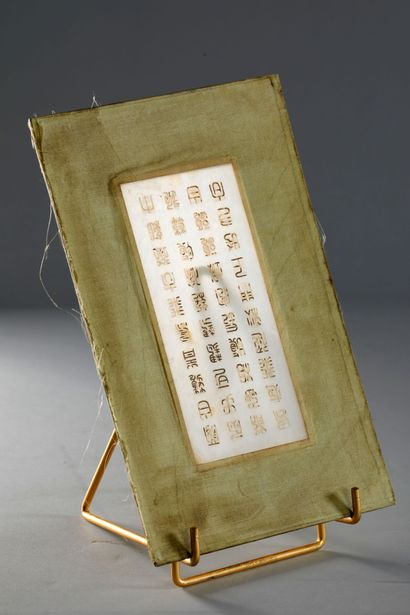 null CHINA, early 20th century. Five pages of a jade book engraved with golden characters....
