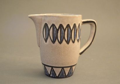 null Ceramic pitcher with blue geometrical decoration underlined by black on cream...