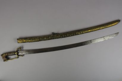 null Oriental sword called Nimcha. Brass and horn mounting, curved blade with four...
