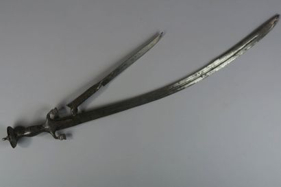 null Indian sword called Talwar. Engraved iron mount with two bent quillons. 

	Blade...