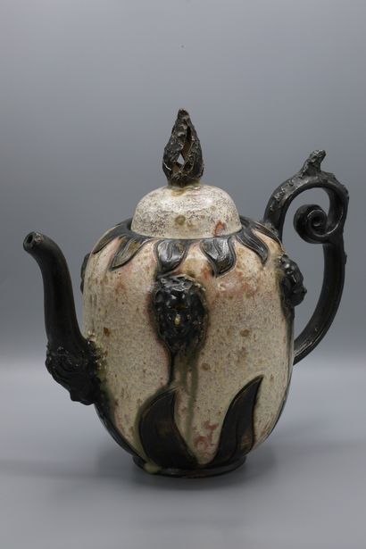 null Sylvain HUBLET (1905-1988) Large decorative stoneware teapot with applied visges....