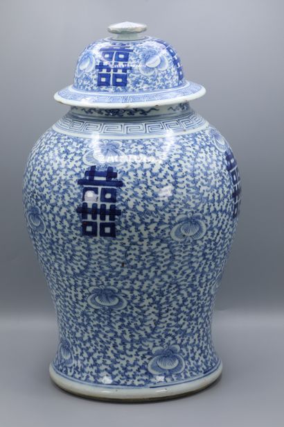 null China, late 19th - early 20th century. A white-blue enameled porcelain vase....