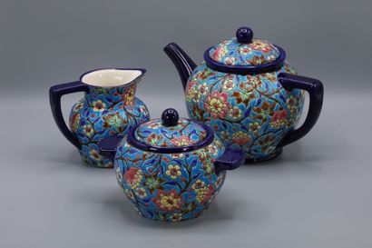 null LONGWY, Part of tea service

Composed of a teapot, a covered sugar bowl and...