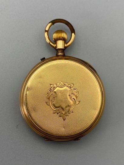 null Yellow gold collar watch with shield decoration on a guilloche background No....