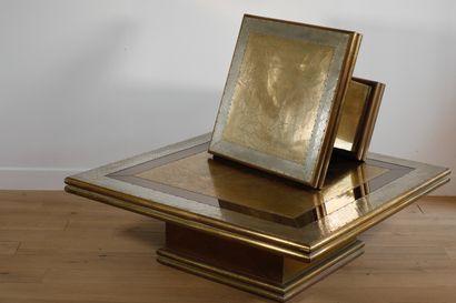 null Rudolfo DUBARRY Small square coffee table in gilded brass and stamped metal...