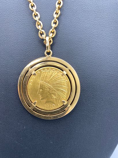 null 10 $ liberty 1910, pièce en or monté en pendentif avec une chaine en or jaune.

Poids...