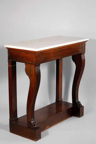 null Mahogany and mahogany veneer CONSOLE with geometrical decoration of brass fillets...